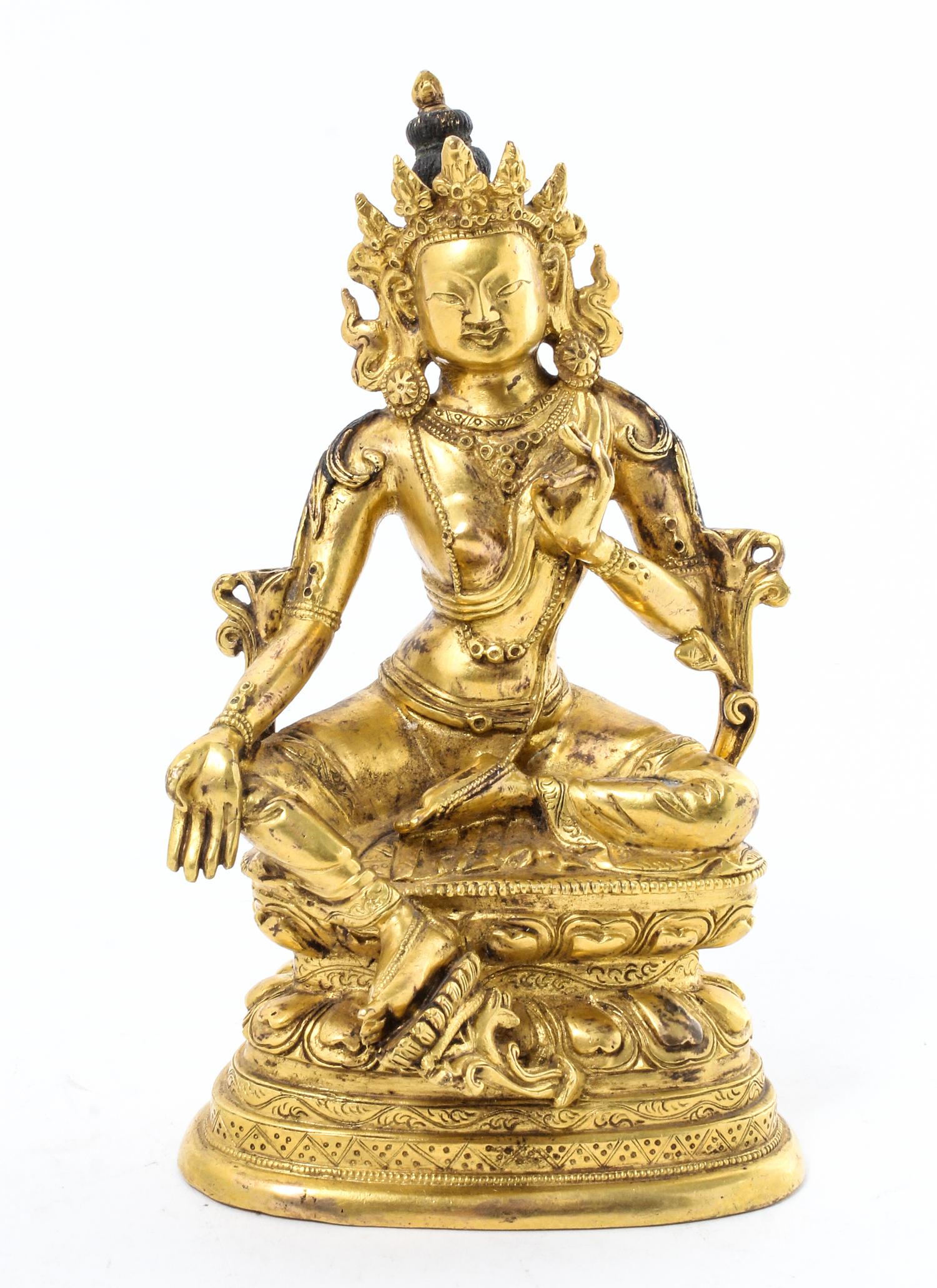 A Chinese Gilt Bronze Figure Height 6 1/4 inches. — 20TH CENTURY