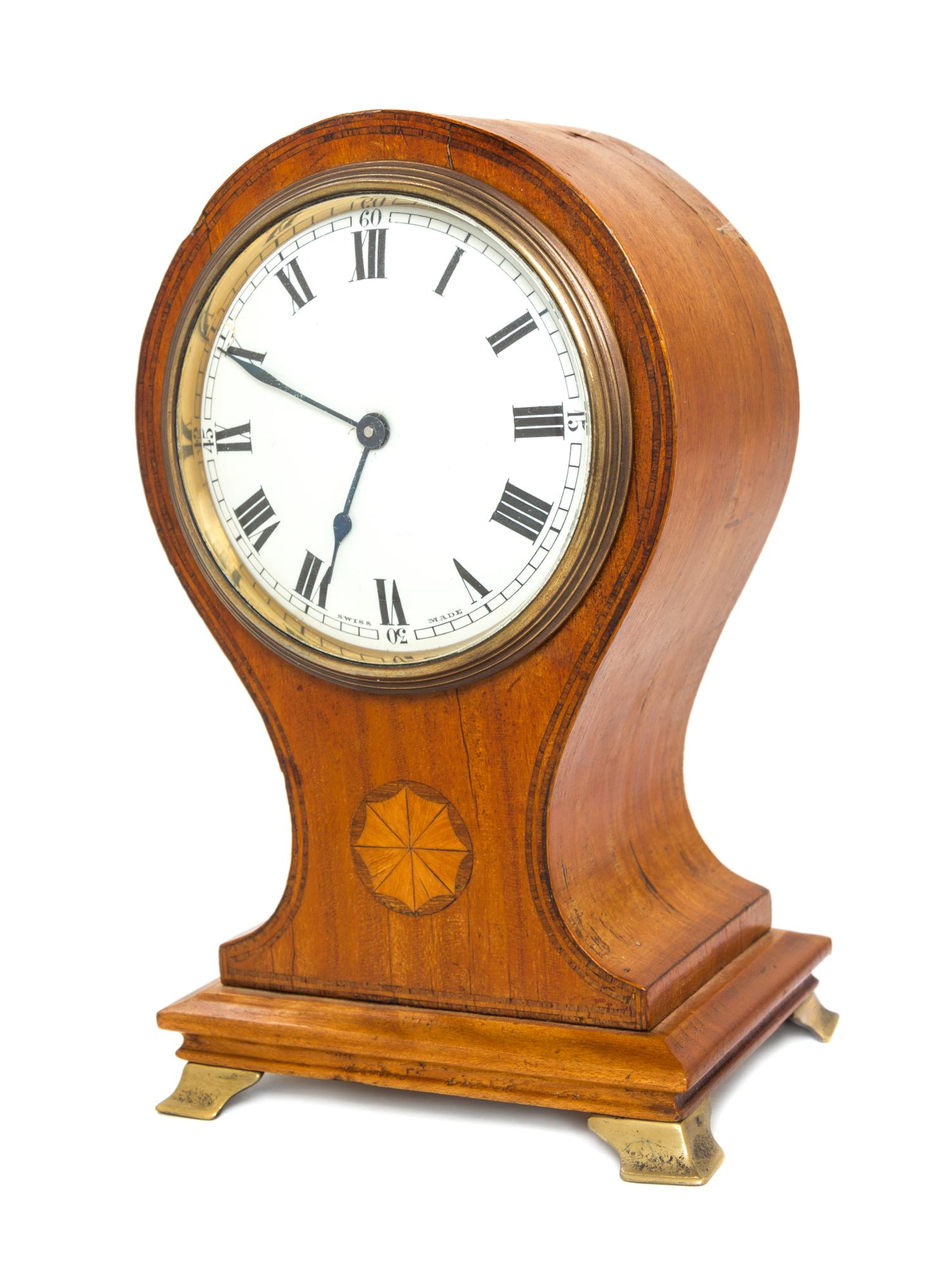 An English Inlaid Satinwood Balloon Clock Height 7 3/4 inches. — 19TH CENTURY