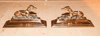 A Pair of Brass Figural Bookends. Width 9 1/4 inches.