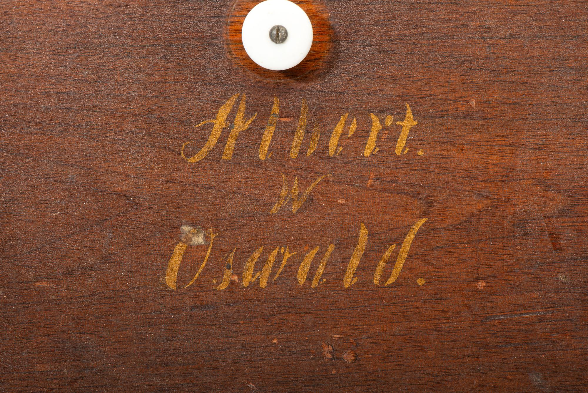 A Late Classical Parcel Gilt Desk Cupboard