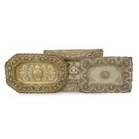 Three Spanish Colonial silver repoussé rectangular sideboard dishes Possibly Potosi, Bolivia, early 18th century
