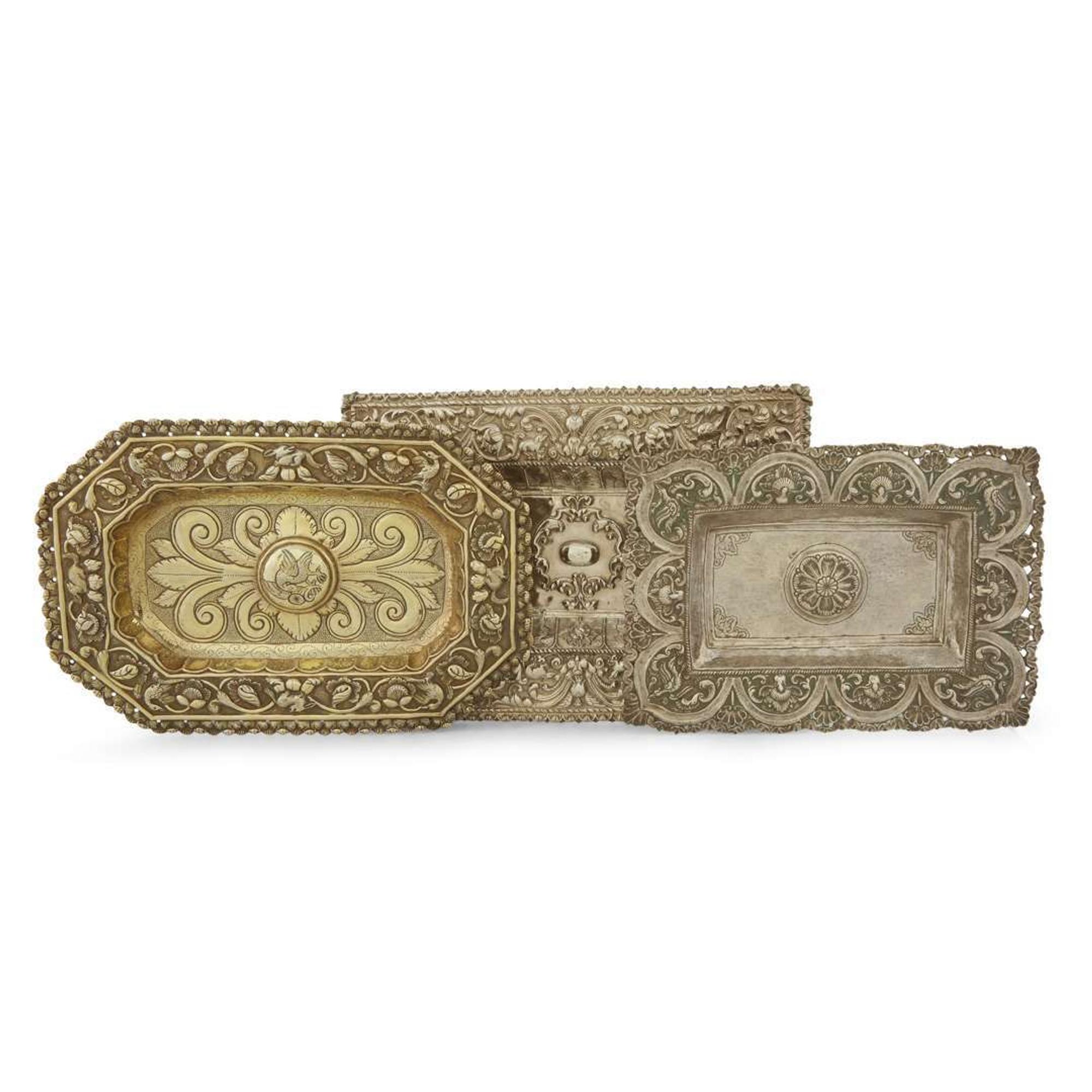 Three Spanish Colonial silver repoussé rectangular sideboard dishes Possibly Potosi, Bolivia, early 18th century
