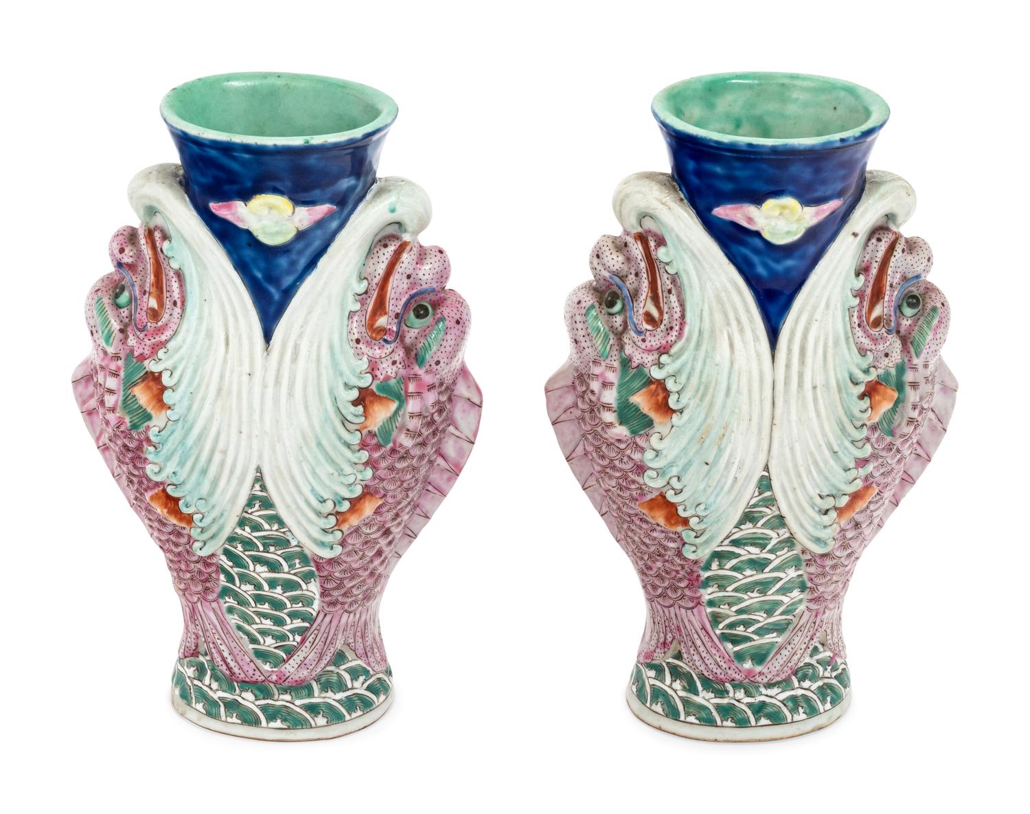 A Pair of Chinese Famille Rose 'Capricorns' Porcelain Vases