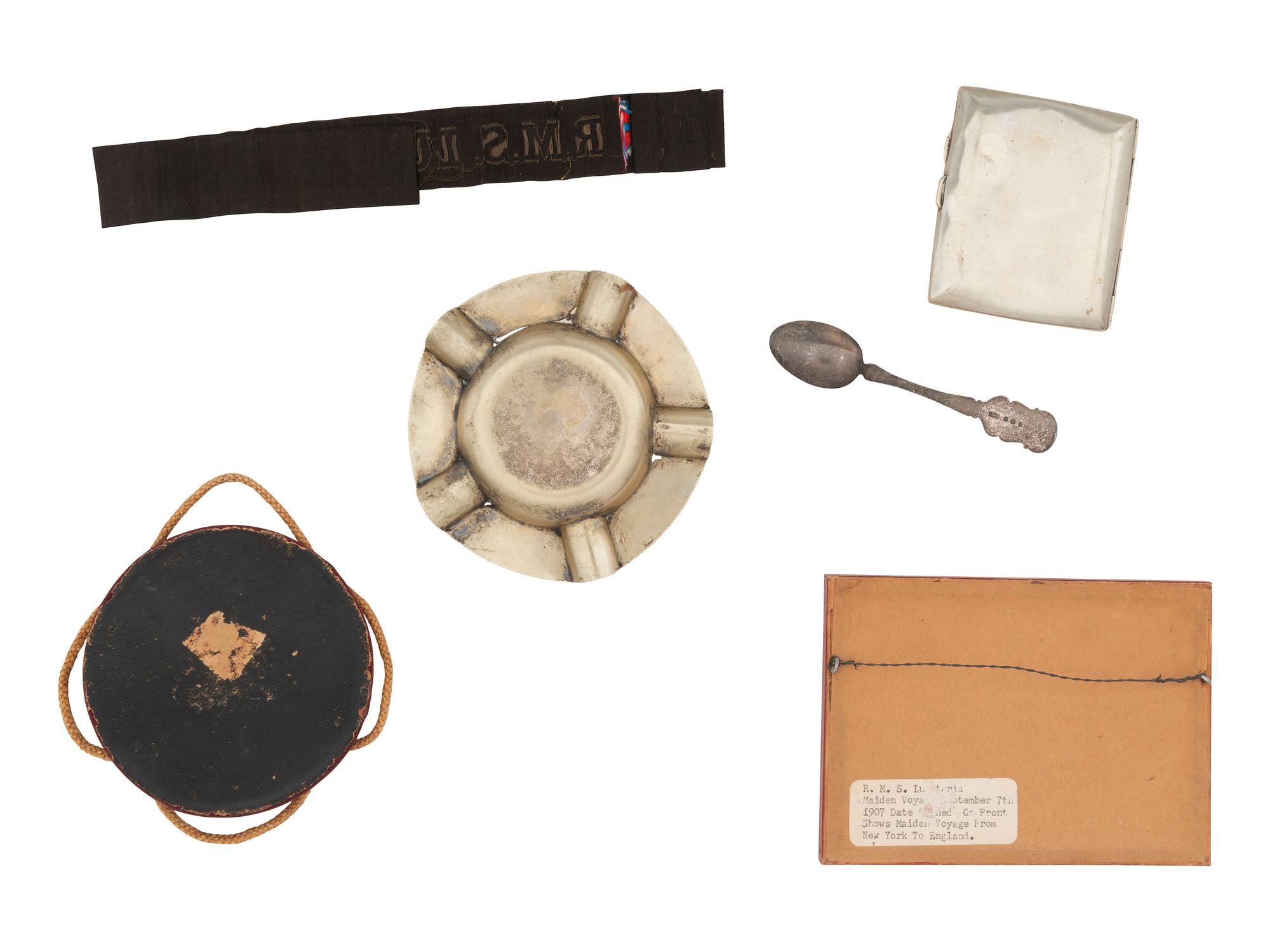 [TRANSPORTATION]. RMS Lusitania cap talley with additional souvenirs.