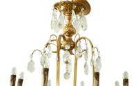 A Louis XV Style Gilt Metal and Cut Glass Six-Light Chandelier