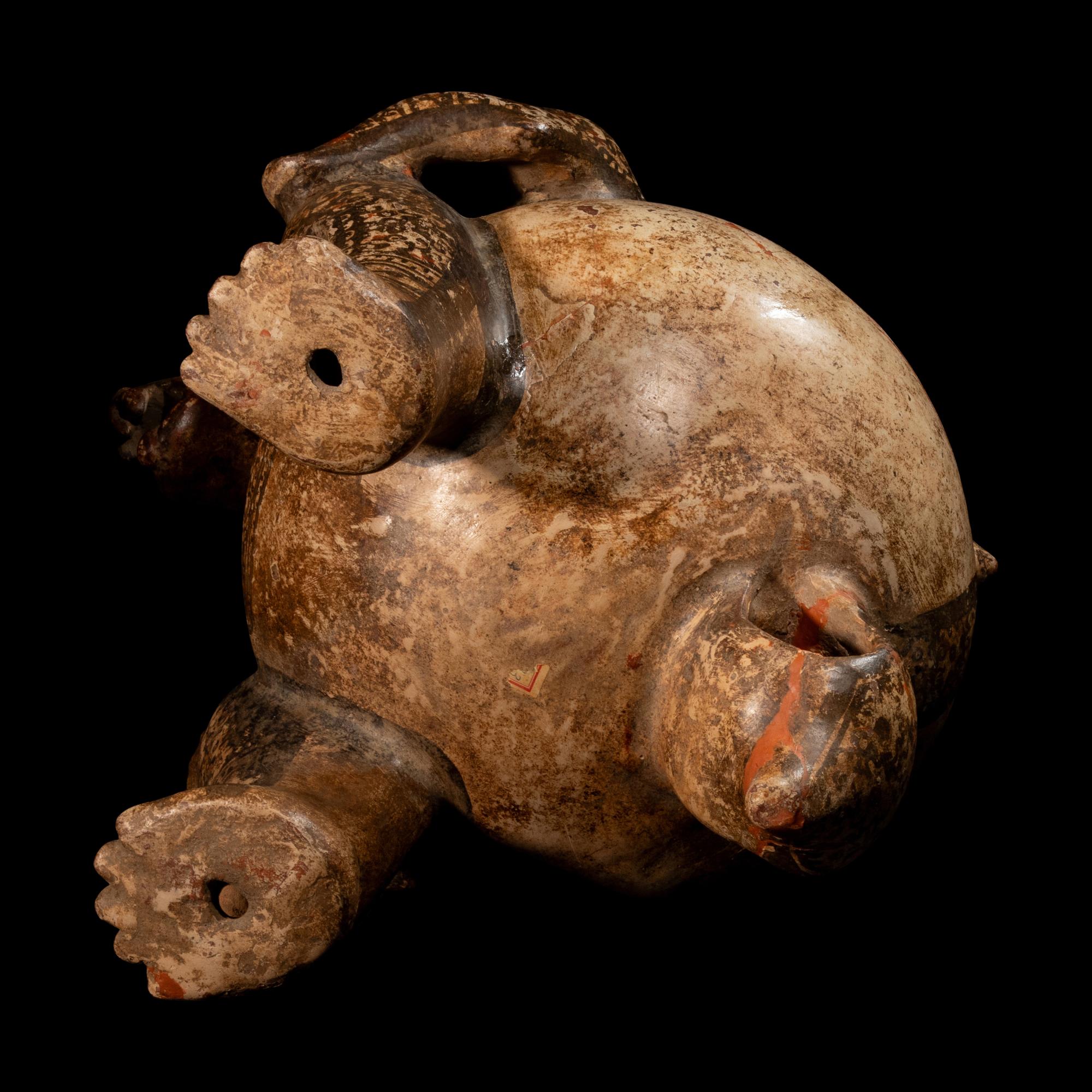 A Nicoya Polychrome Jaguar Effigy Vessel