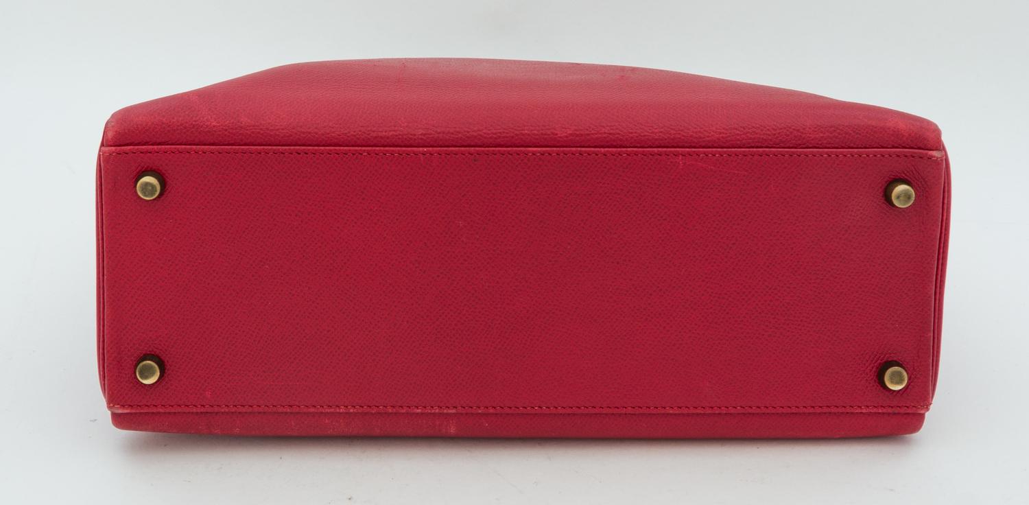 An Hermes Red 32cm Kelly Bag, 12.5" x 9" x 4.5".