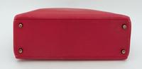 An Hermes Red 32cm Kelly Bag, 12.5" x 9" x 4.5".