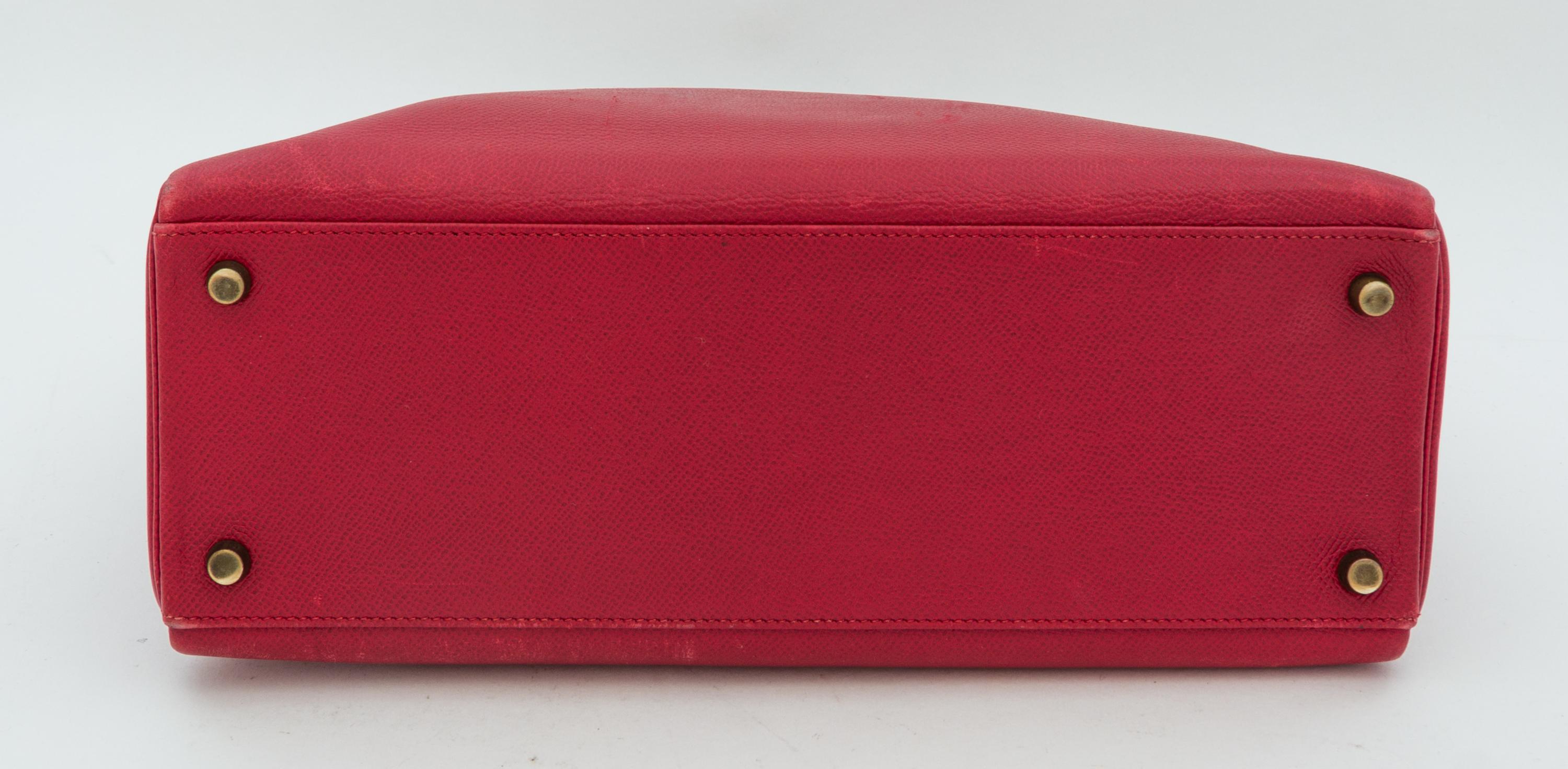 An Hermes Red 32cm Kelly Bag, 12.5" x 9" x 4.5".