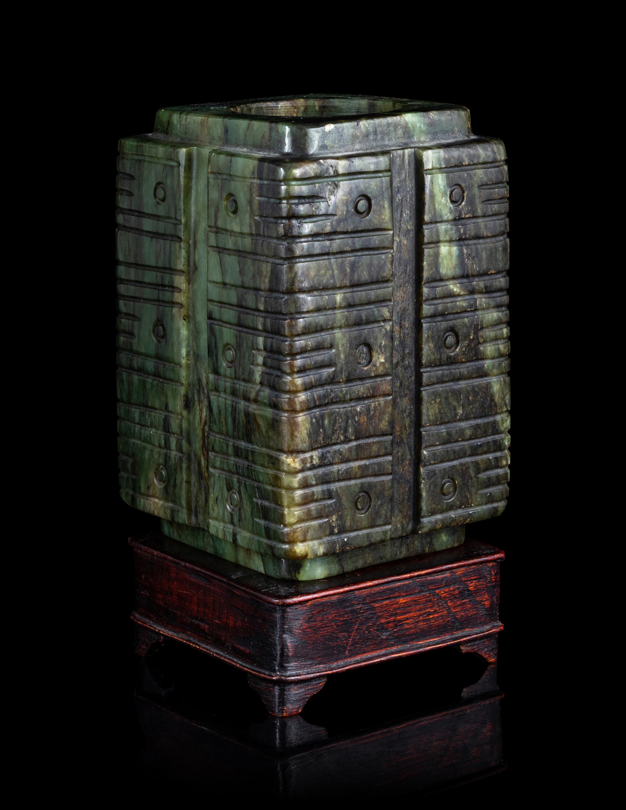 A Chinese Carved Green Jade Cong