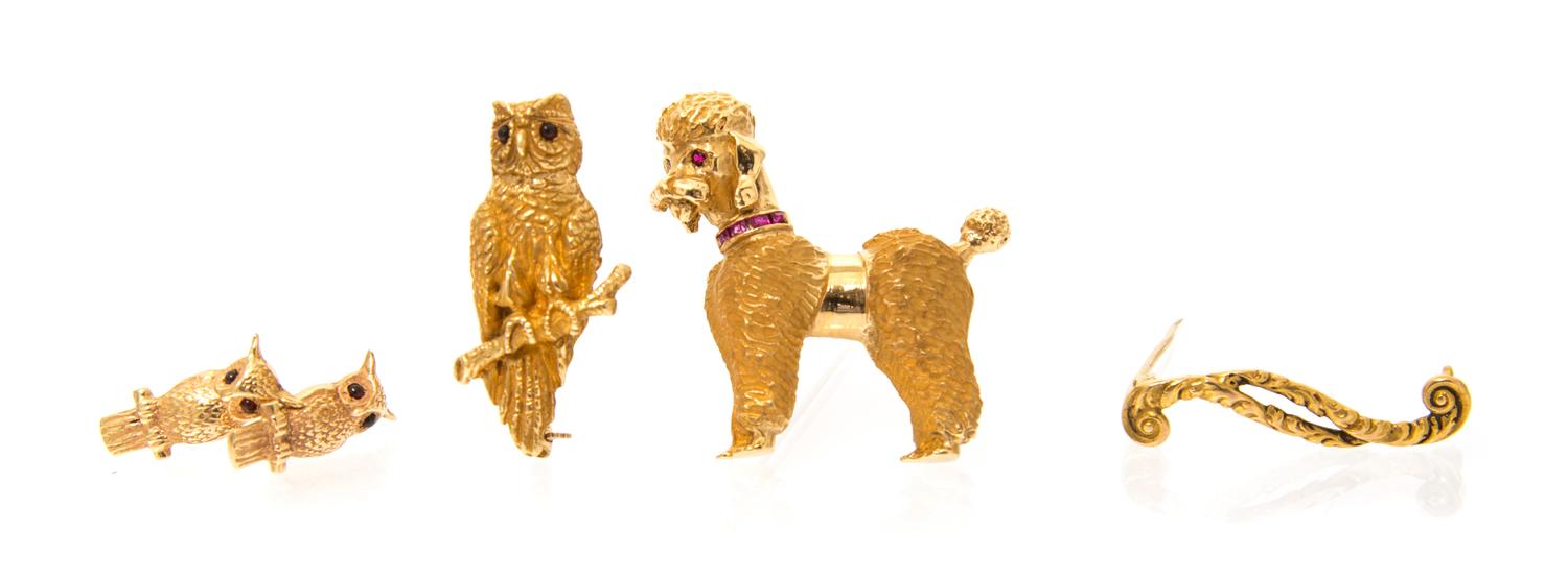 A Collection of Yellow Gold, Ruby and Garnet Jewelry, 16.80 dwts.