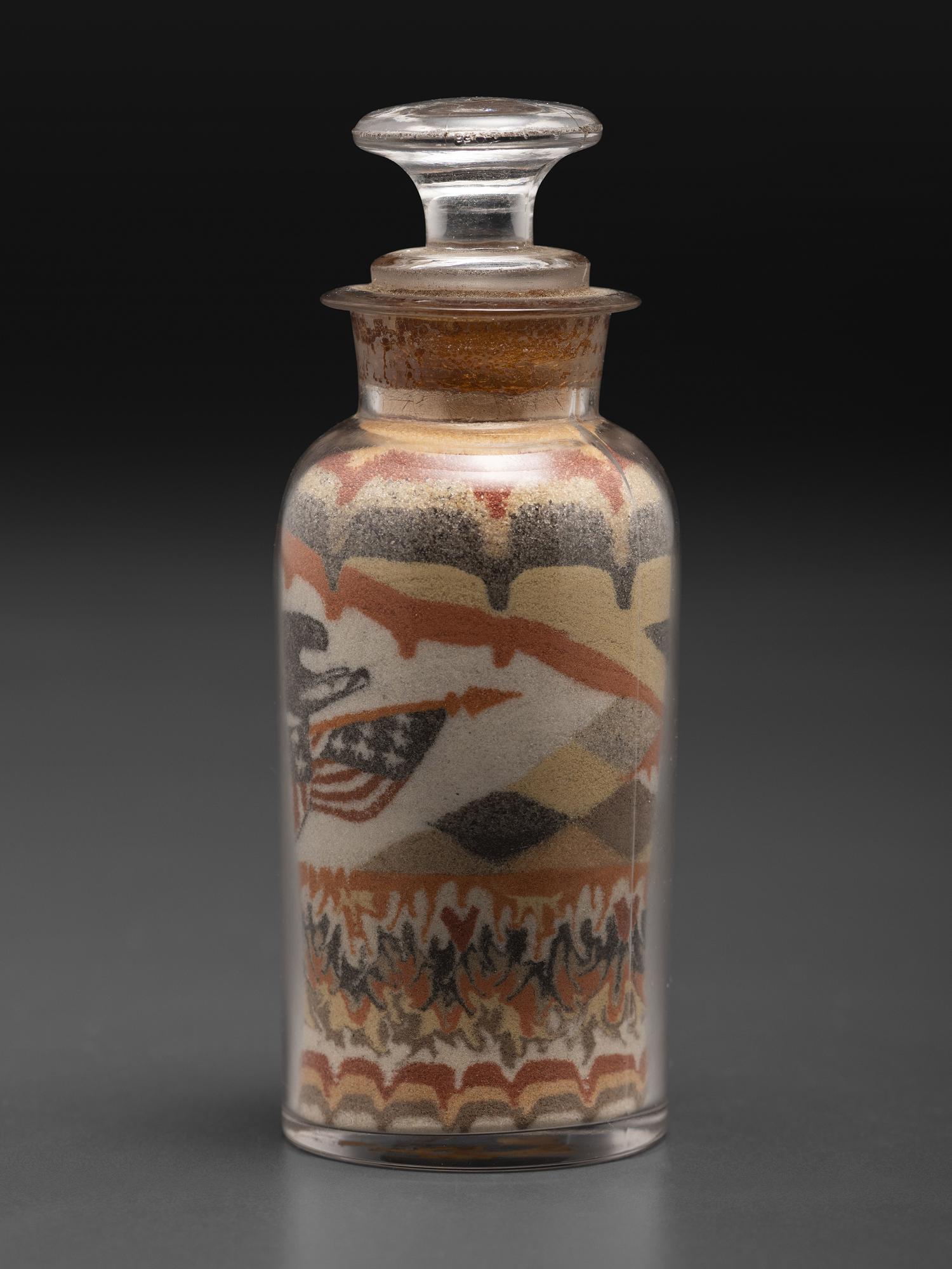 An Early Andrew Clemens (American, 1857-1894) Eagle Sand Bottle