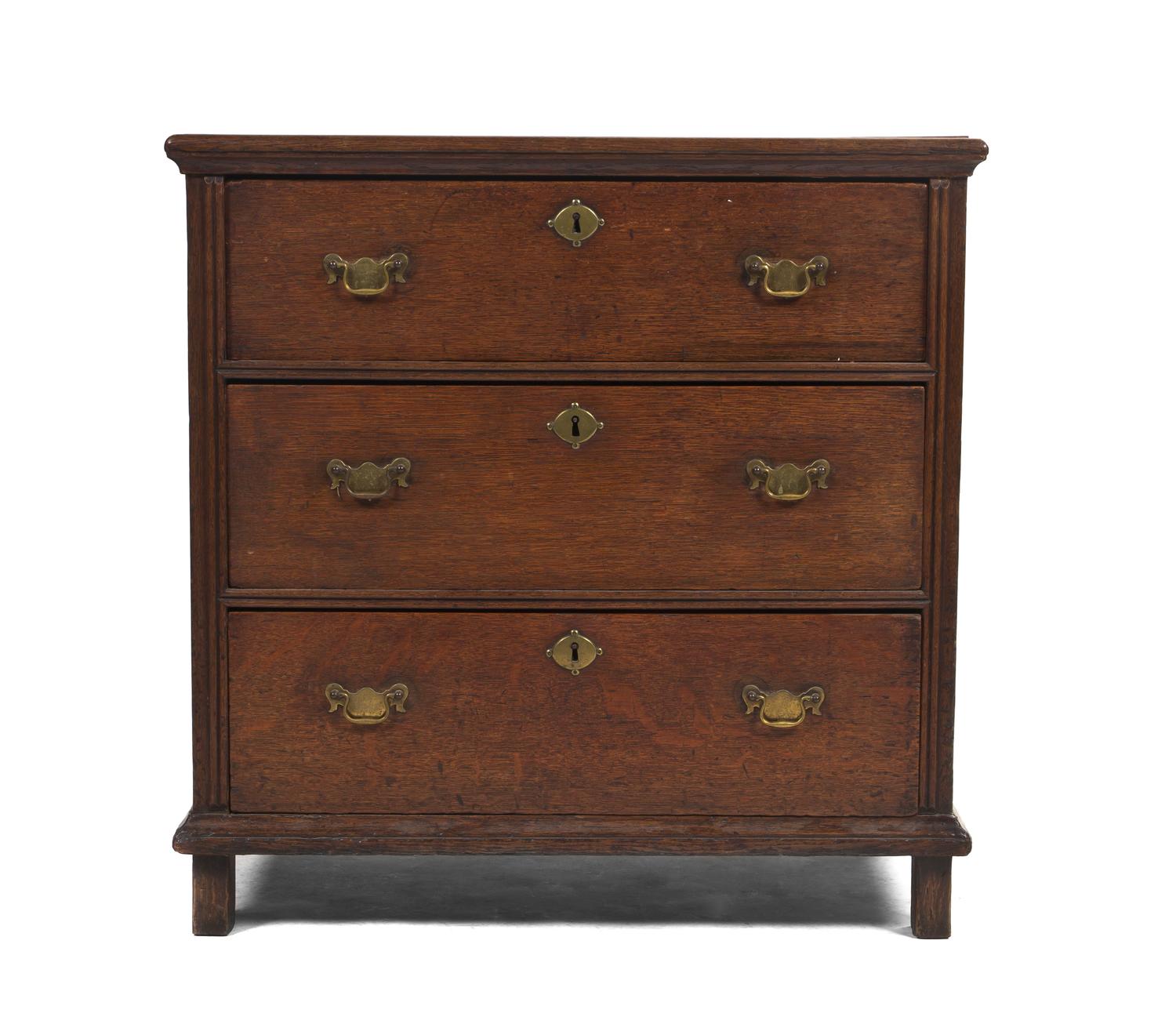A George III Diminutive Oak Chest of Drawers, Height 31 1/4 x width 31 x depth 20 1/2 inches.