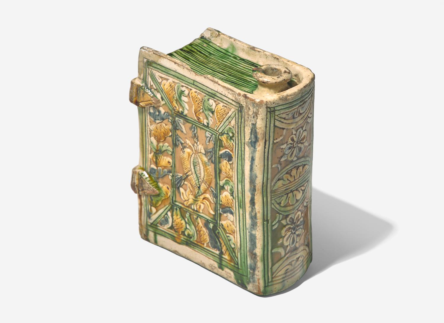 A Continental Faience Pottery Book-Form Flask