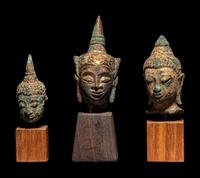 Three Thai Bronze Buddha Heads with Stands