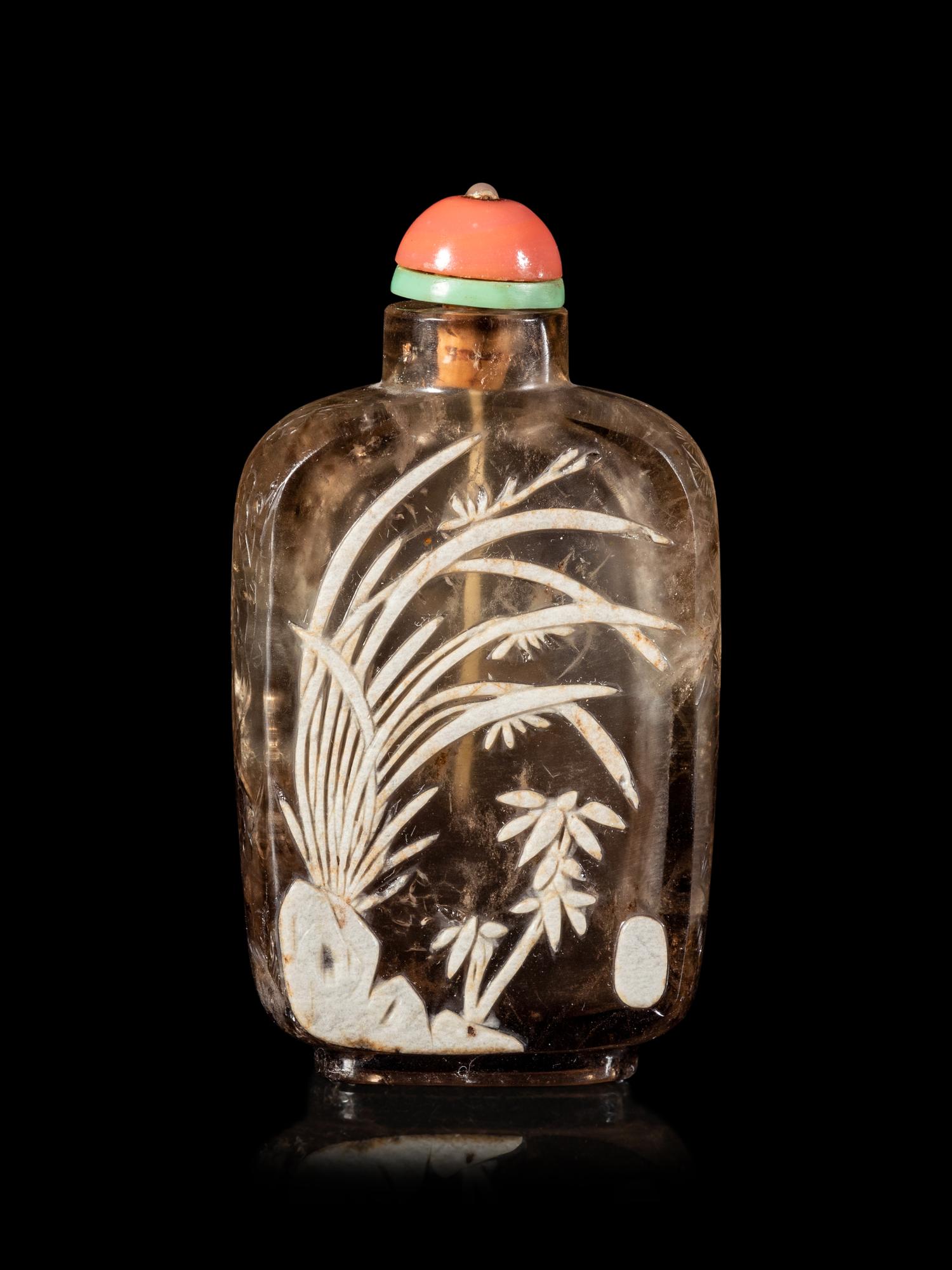 A Carved Smoky Quartz Snuff Bottle