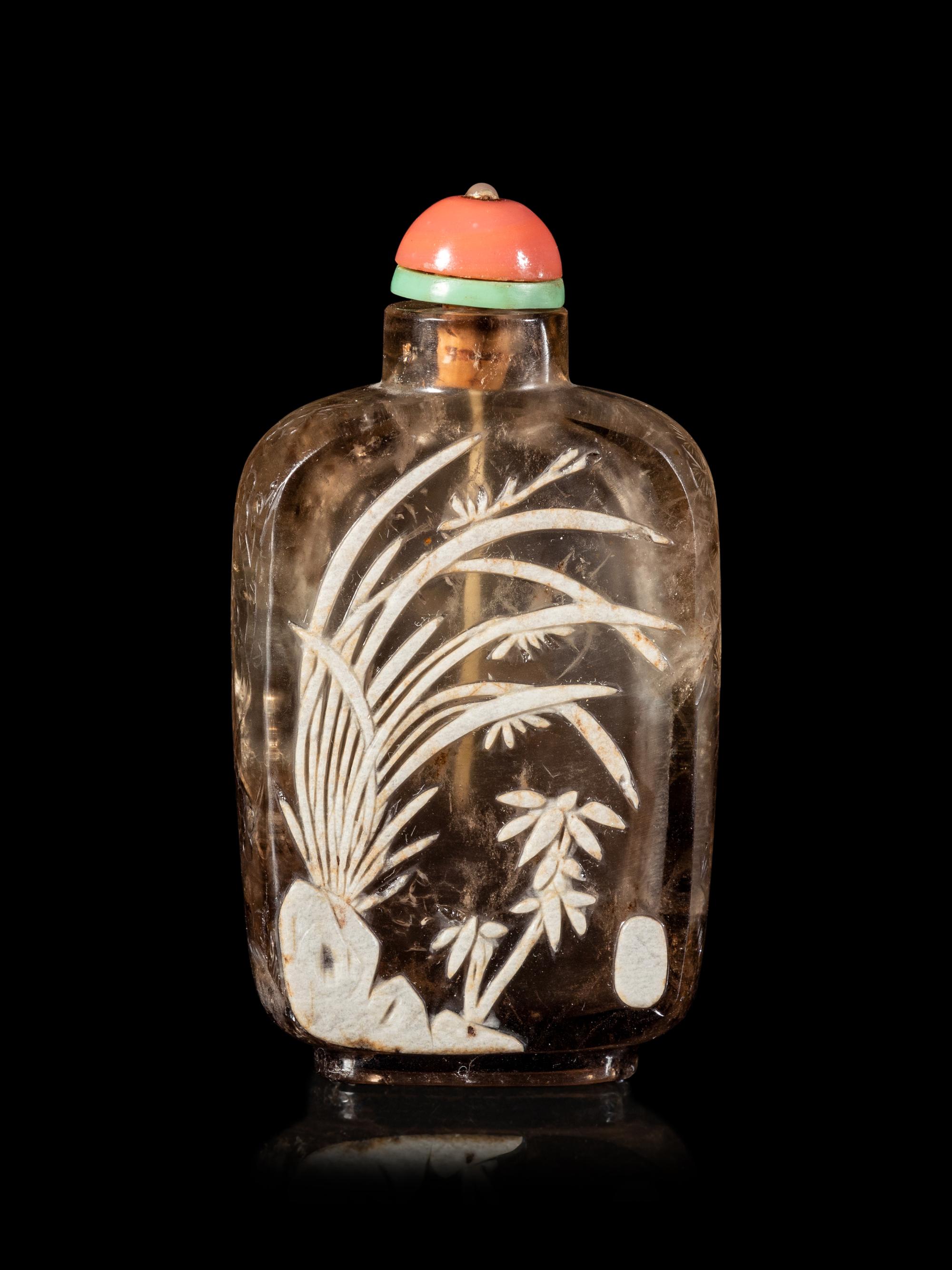 A Carved Smoky Quartz Snuff Bottle
