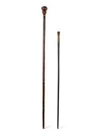 Two Figural Walking Sticks or Canes