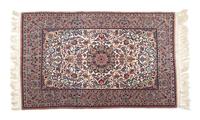 A Hereke Silk Rug — 20TH CENTURY