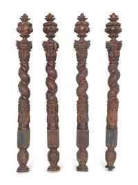 A Set of Four Continental Baroque Carved Walnut Bed Posts