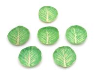 A Set of Six Dodie Thayer Lettuceware Butter Pats — 20TH CENTURY