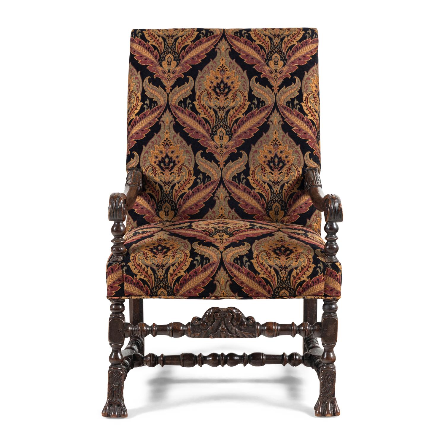 A Louis XIII Carved Walnut Fauteuil