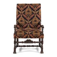 A Louis XIII Carved Walnut Fauteuil
