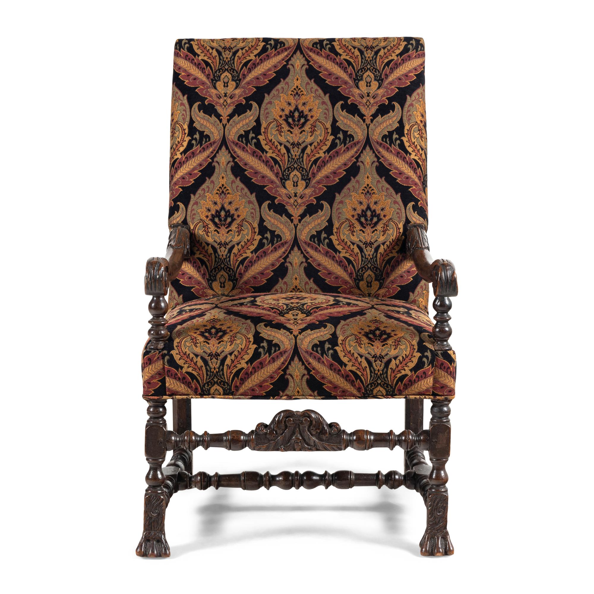 A Louis XIII Carved Walnut Fauteuil