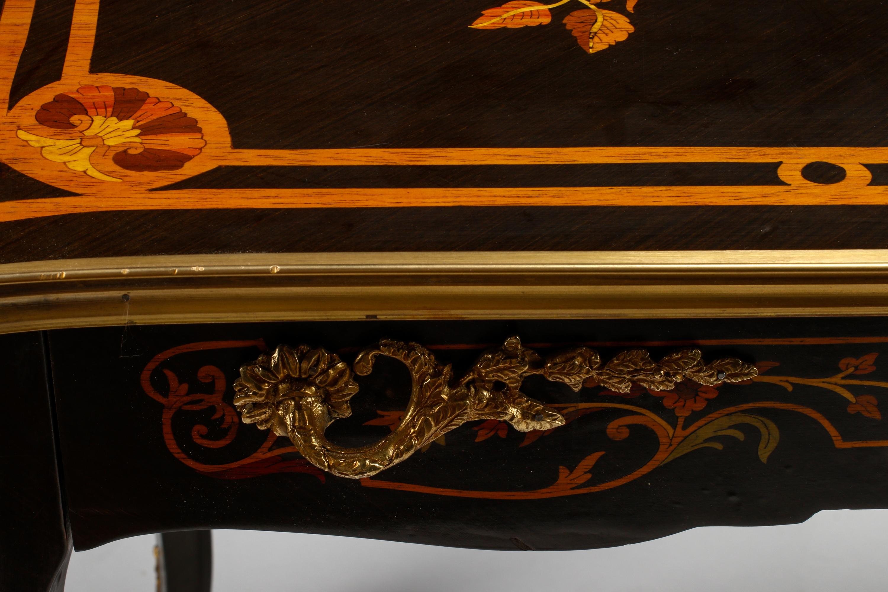 A Louis XV Style Marquetry and Gilt Bronze Mounted Bureau Plat