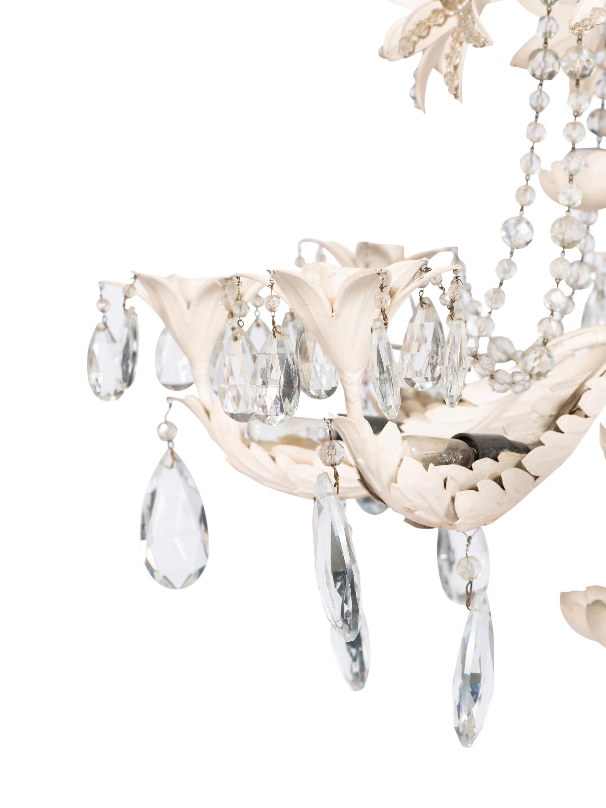 A Pair of Painted Metal and Cut Glass Eight-Light Chandeliers