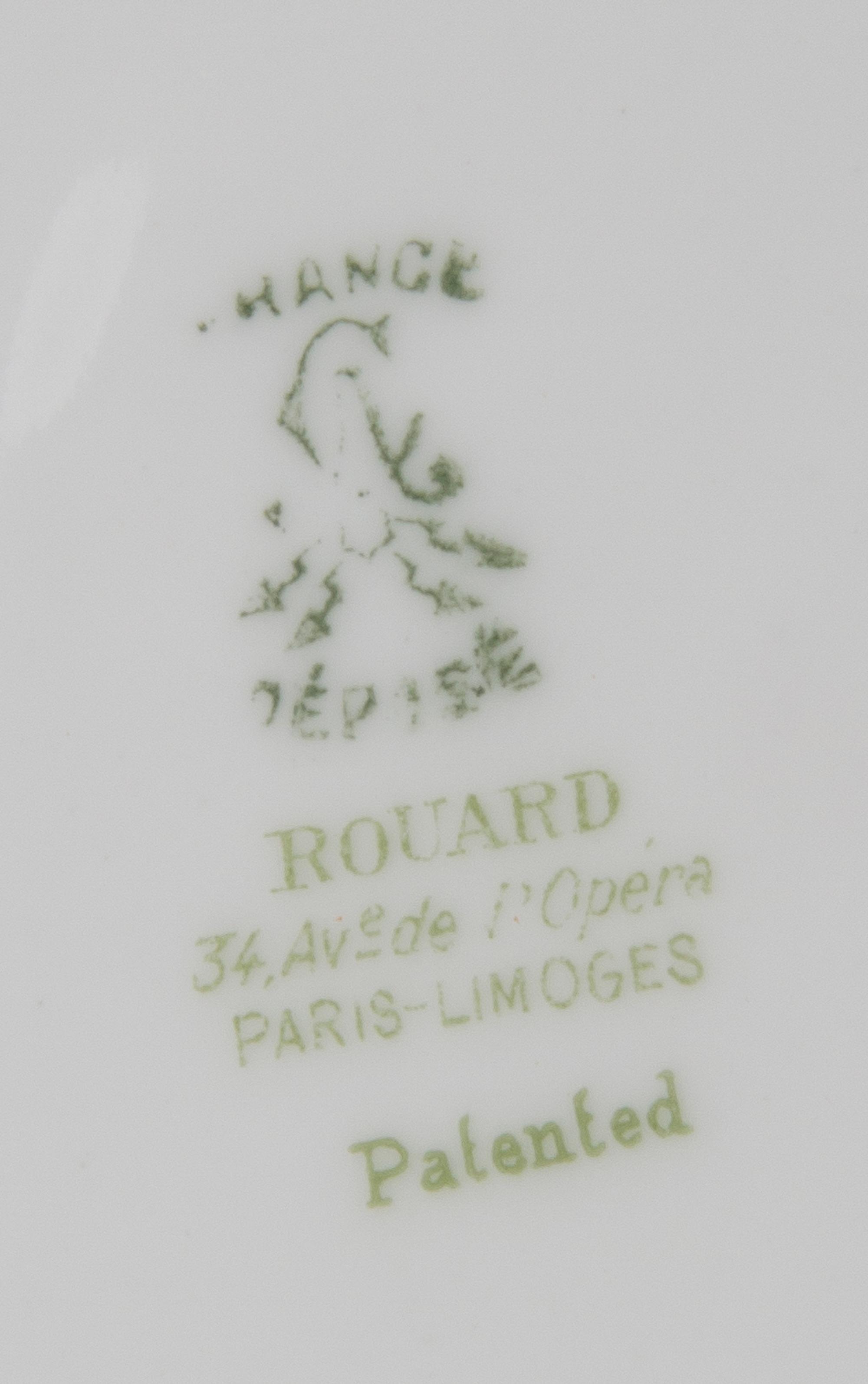 Twelve French Porcelain Plates, Rouard, Diameter 10 1/4 inches.