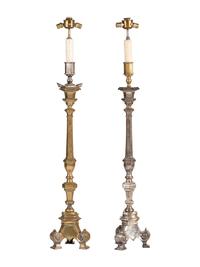 A Pair of Continental Baroque Style Silvered Brass Floor Candlestands