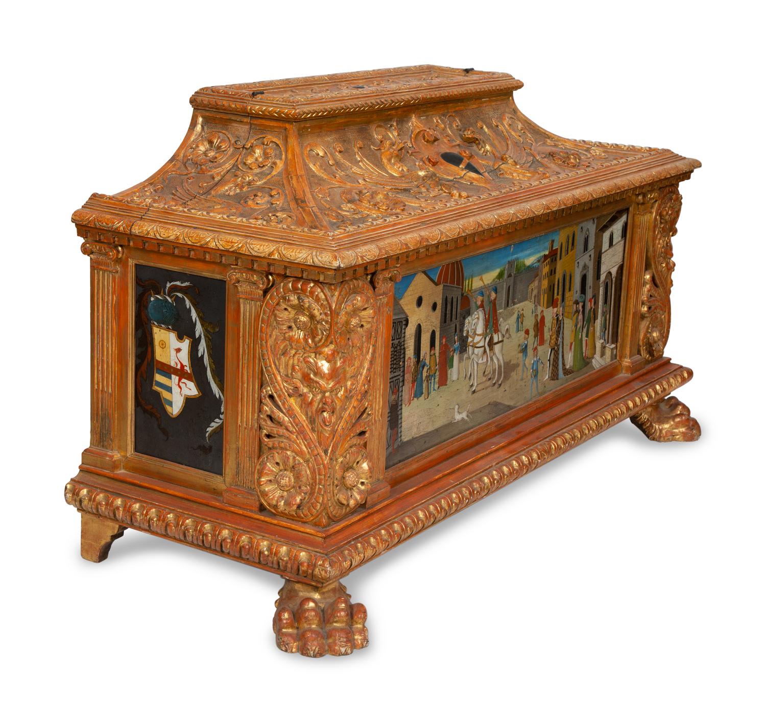 An Italian Renaissance Style Carved, Painted and Parcel Gilt Cassone