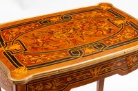 A Pair of Louis XV Style Gilt Bronze Mounted Marquetry Side Tables