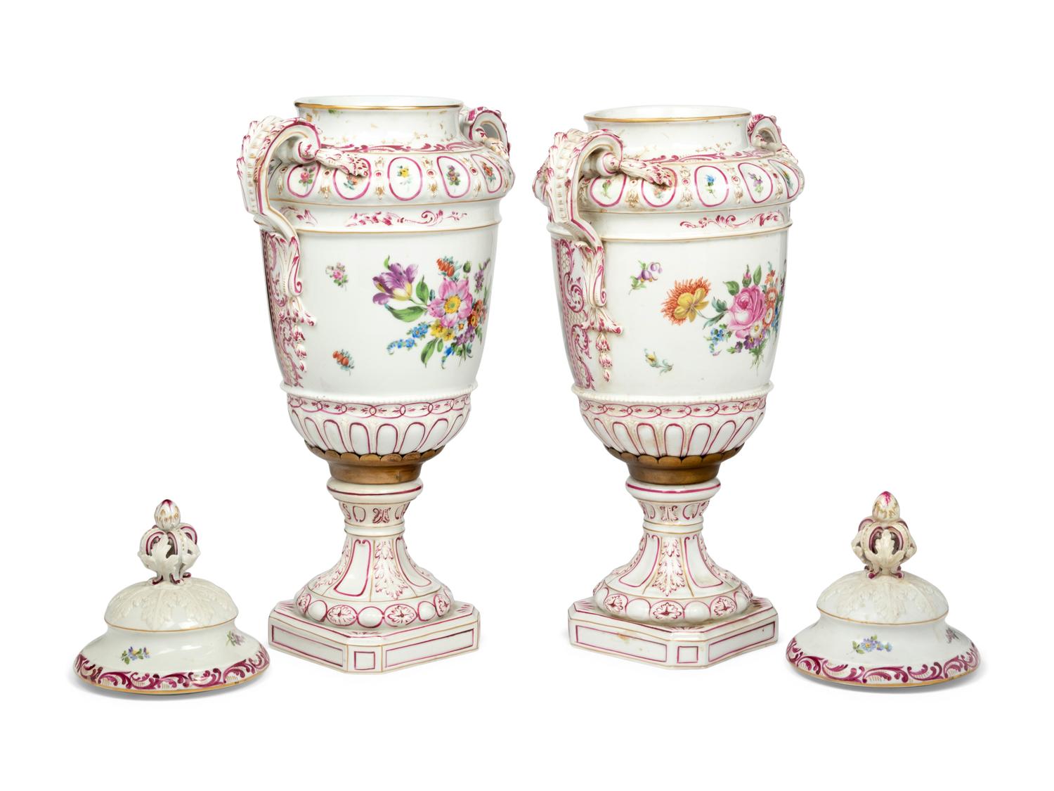 A Pair of Continental Porcelain Urns