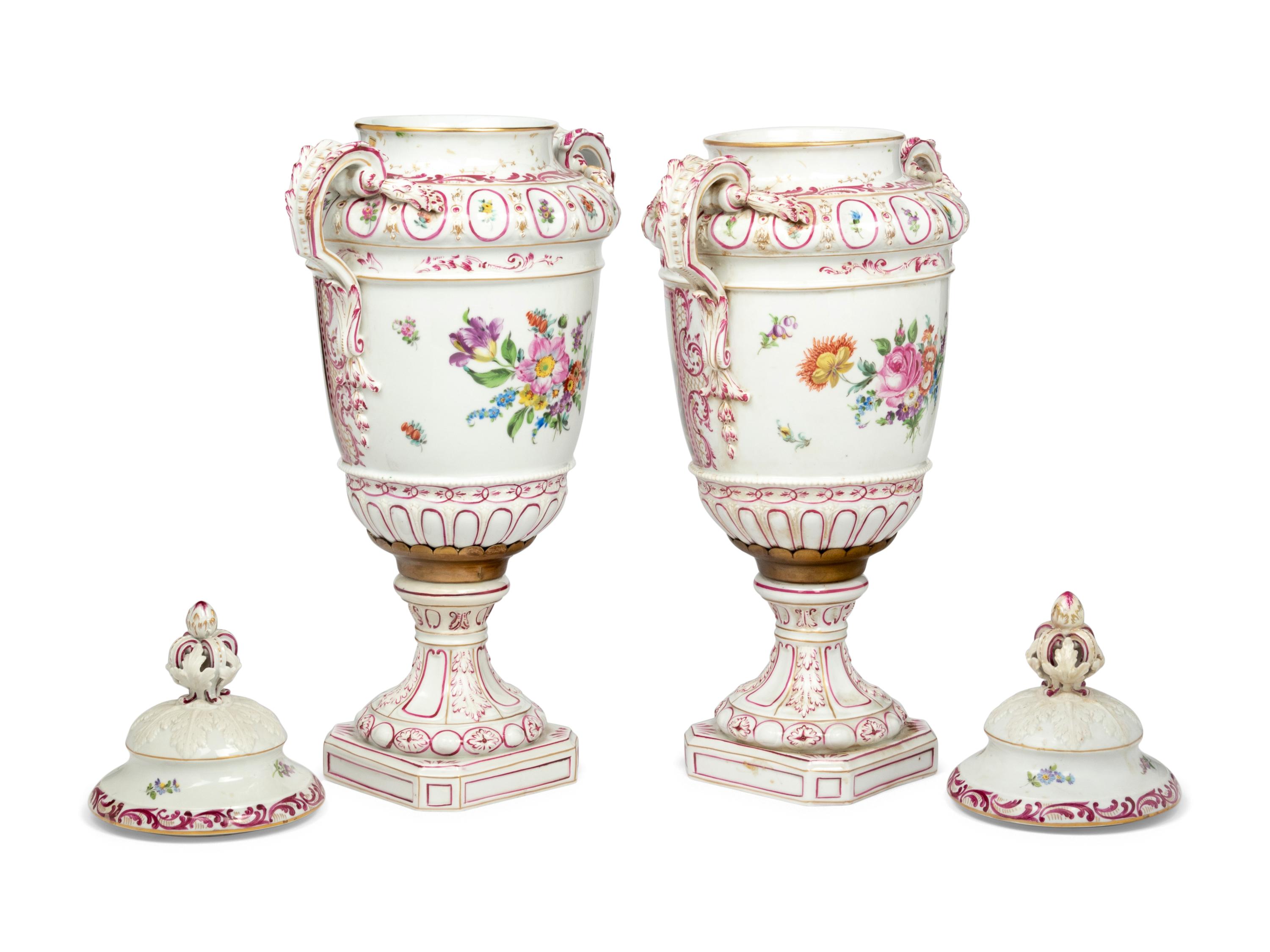 A Pair of Continental Porcelain Urns