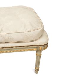 A French Provincial Style Painted and Parcel Gilt Chaise Longue