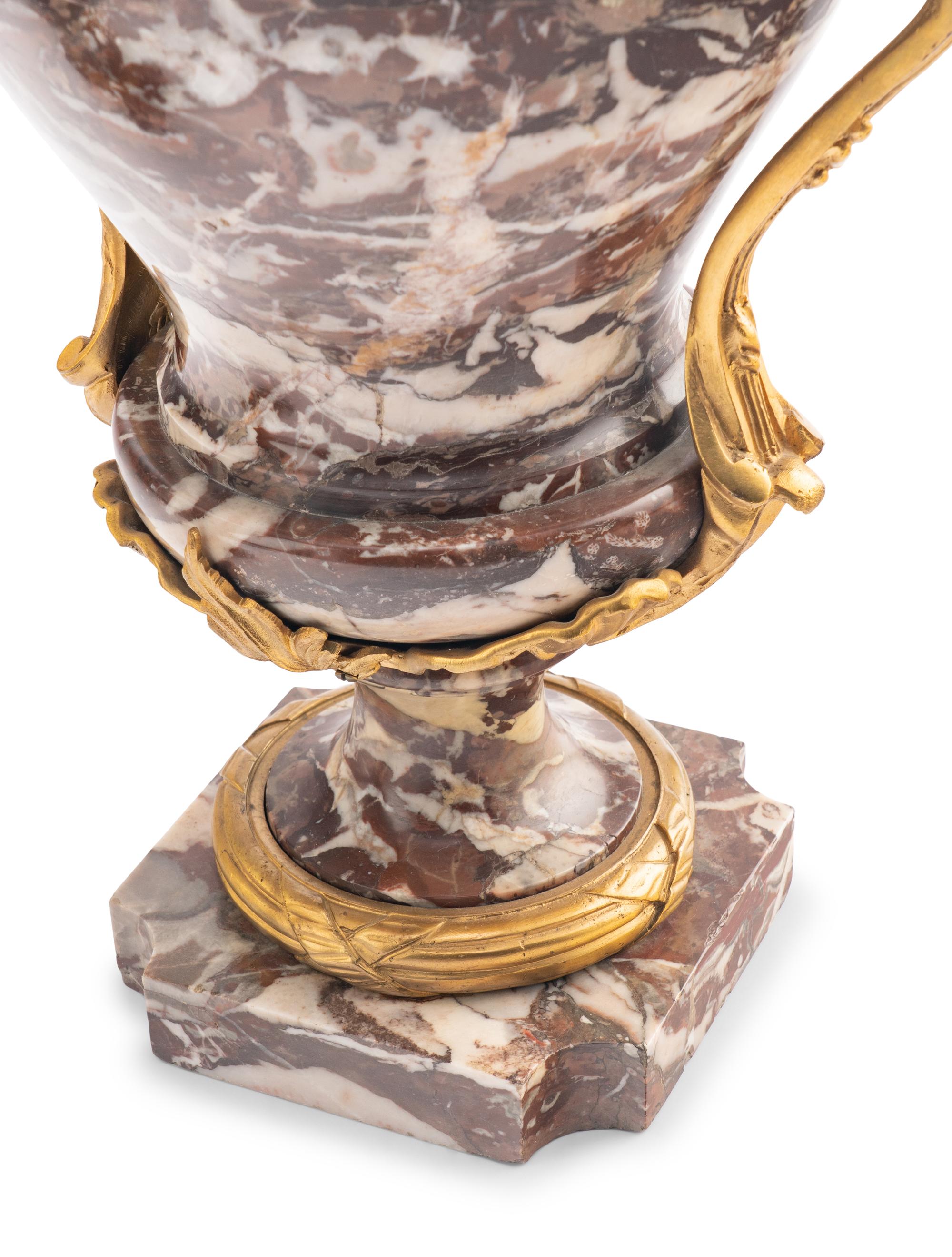 A Pair of French Gilt Bronze Mounted Marble Urns