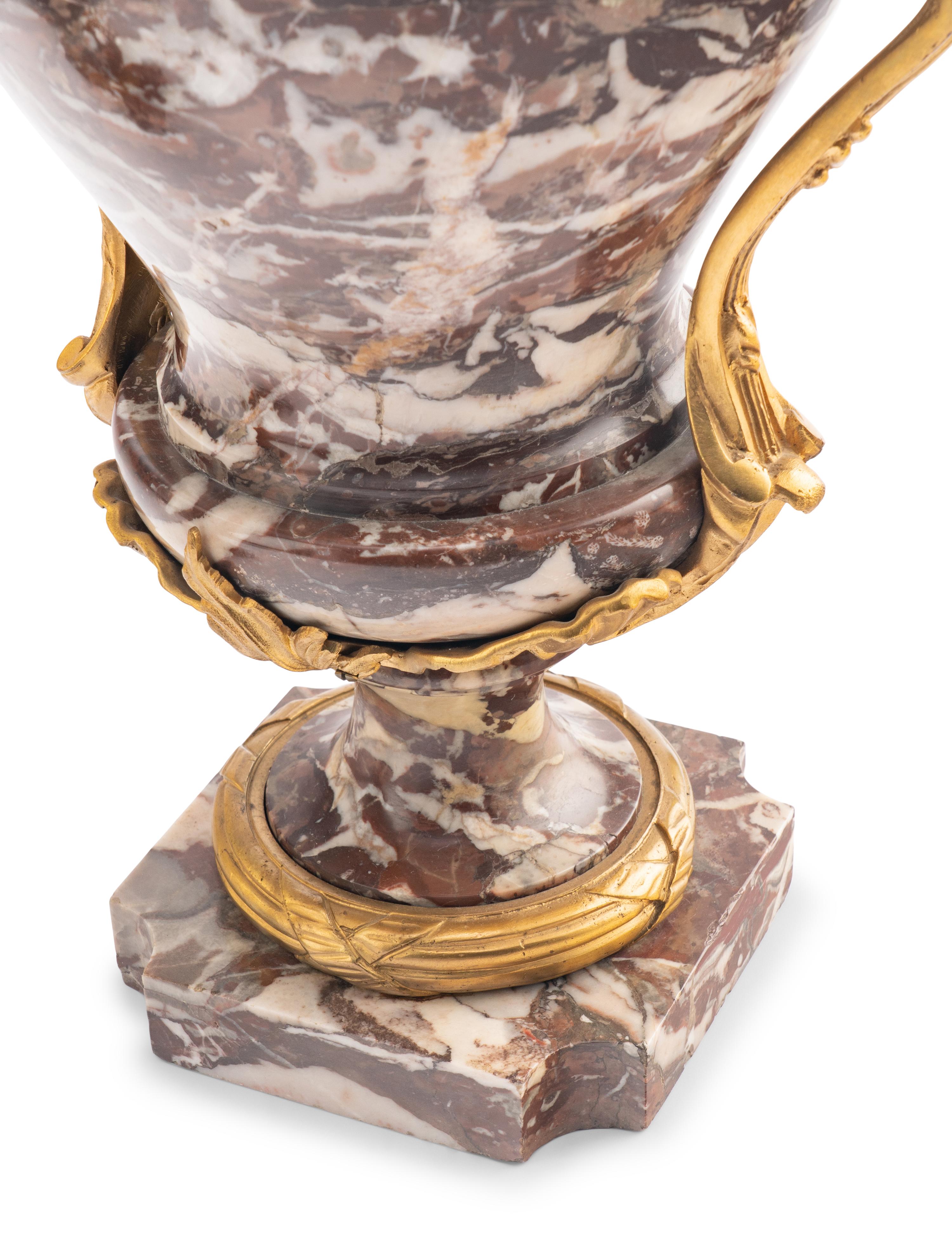 A Pair of French Gilt Bronze Mounted Marble Urns