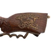 Contemporary Cheekstock Flintlock Rifle in the Style of Schertiger by John B. Derrick (American, b.1936)