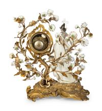 A Continental Gilt Bronze and Porcelain Figural Mantel Clock
