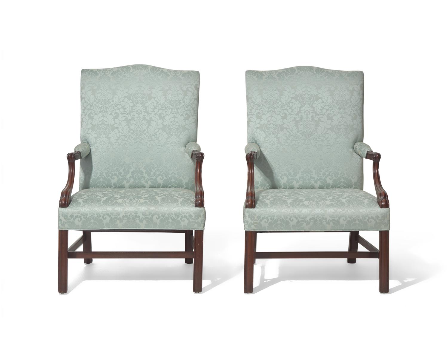 A fine pair of George III mahogany Gainsborough library chairs, circa 1760