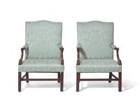 A fine pair of George III mahogany Gainsborough library chairs, circa 1760