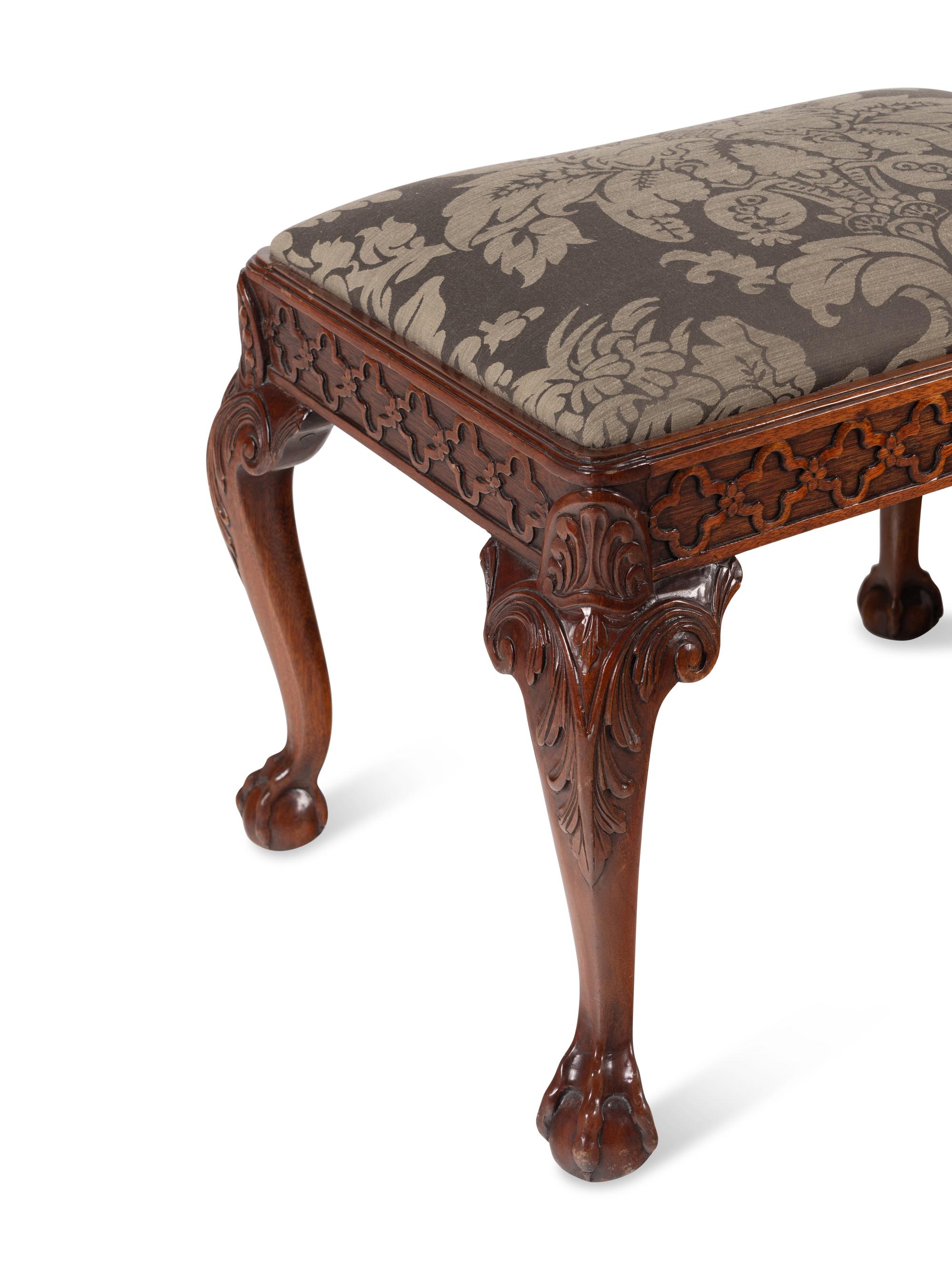 A Pair of George III Style Mahogany Footstools
