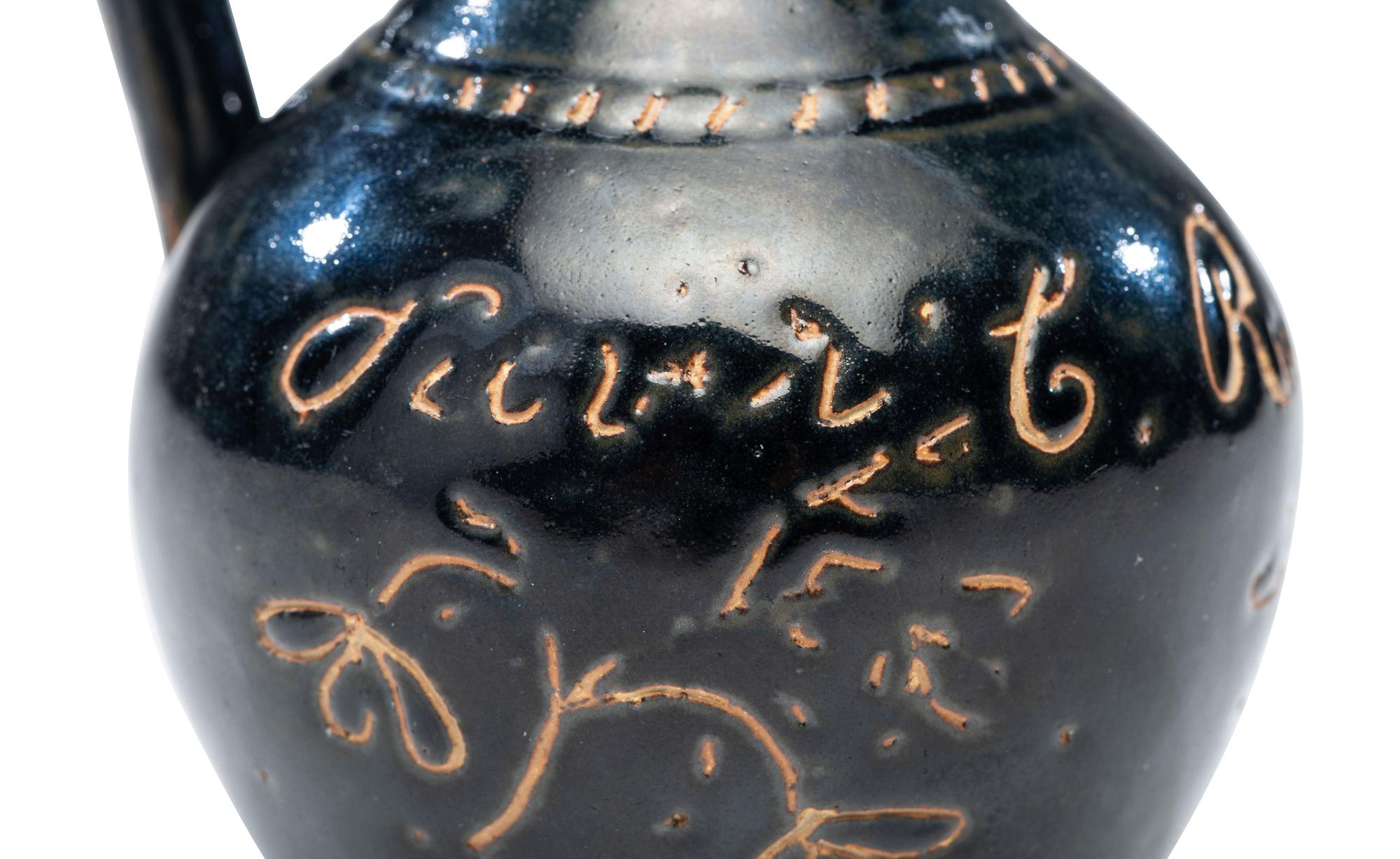 A William H. Rambo Albany Slip-Glazed and Incised Jug