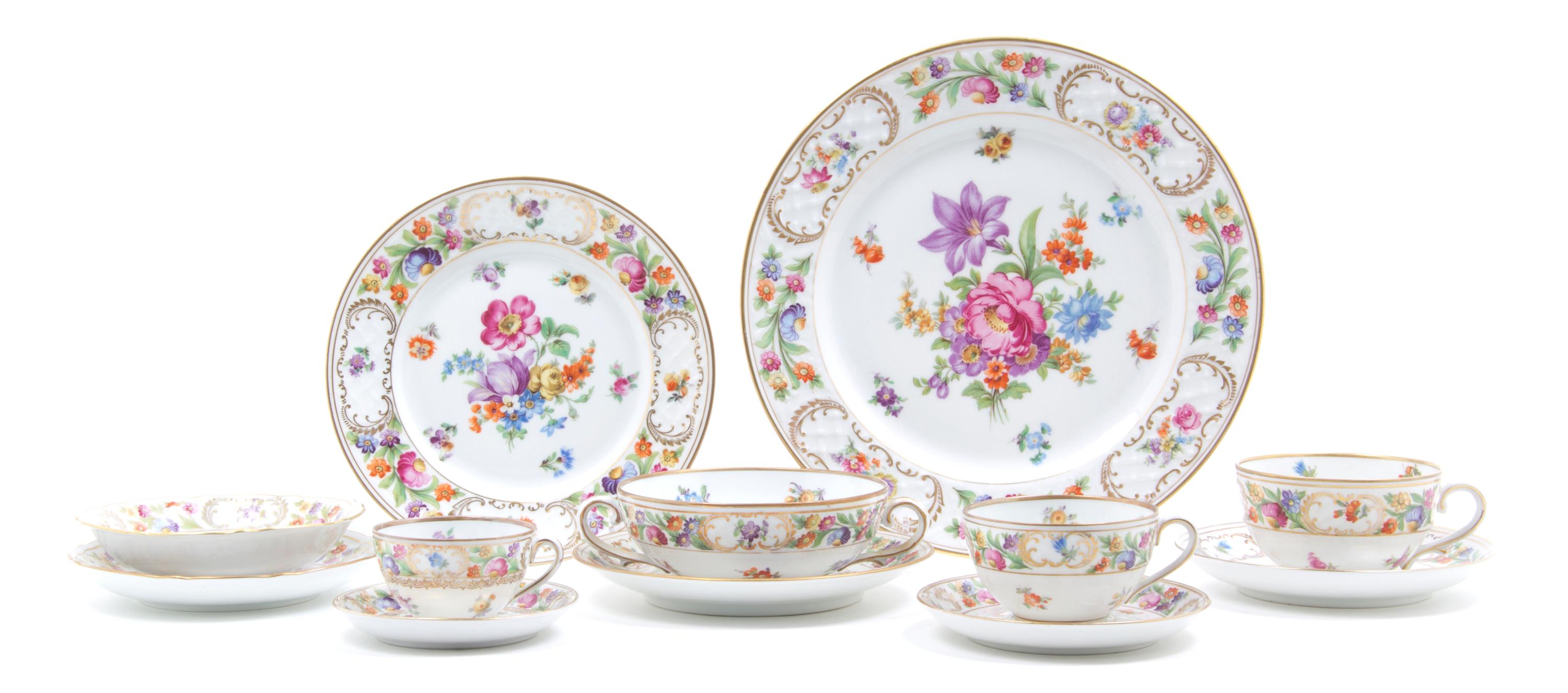 A Bavarian Porcelain Partial Dinner Service for Twelve, Schumann, Diameter of dinner plate 11 inches.