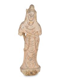 A Chinese Carved Stone Standing Guanyin Figure with Remnants of Polychrome Decoration