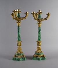 A Pair of Empire Style Ormolu and Malachite Four-Light Candelabra, Height 24 1/8 inches.