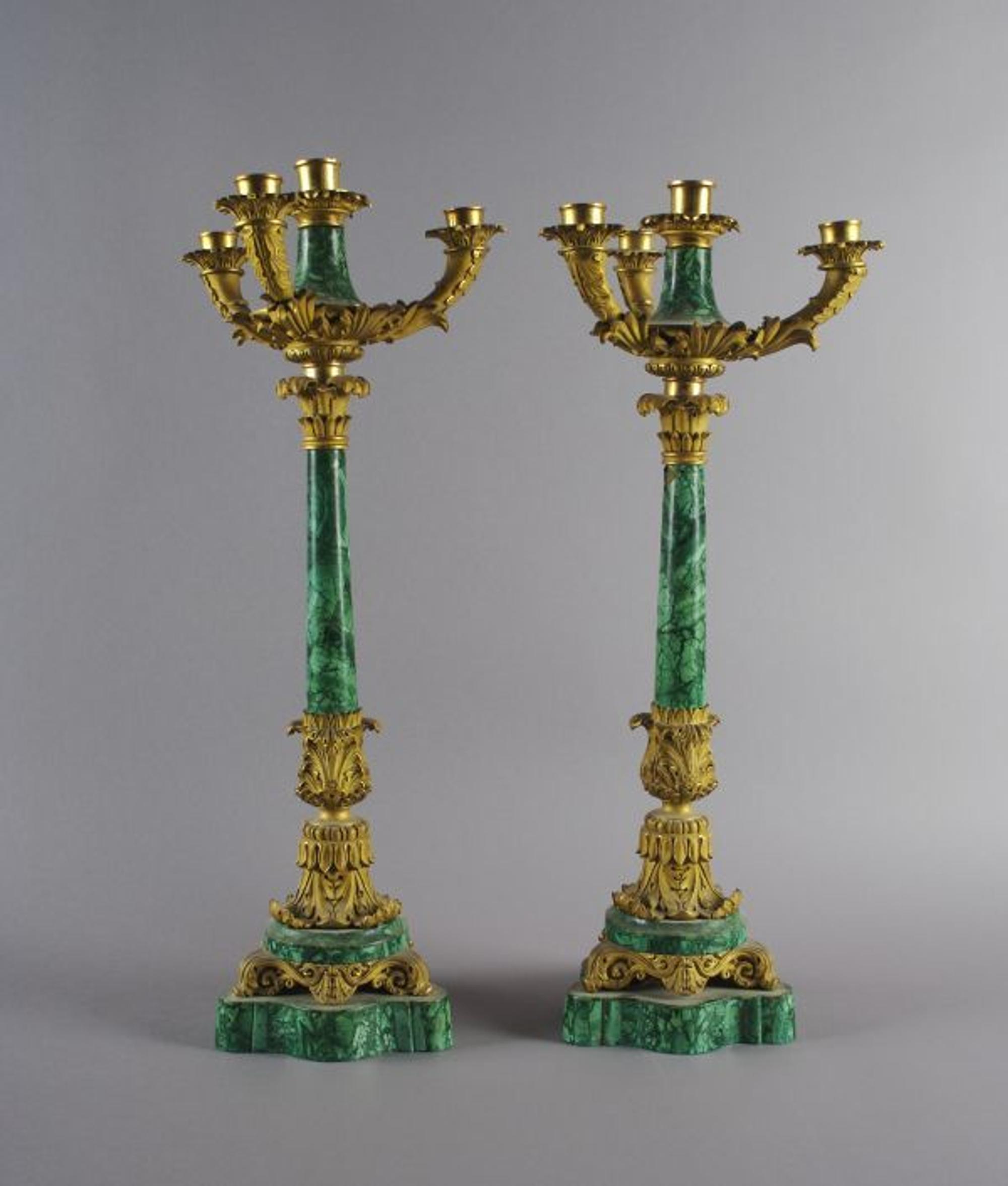 A Pair of Empire Style Ormolu and Malachite Four-Light Candelabra, Height 24 1/8 inches.