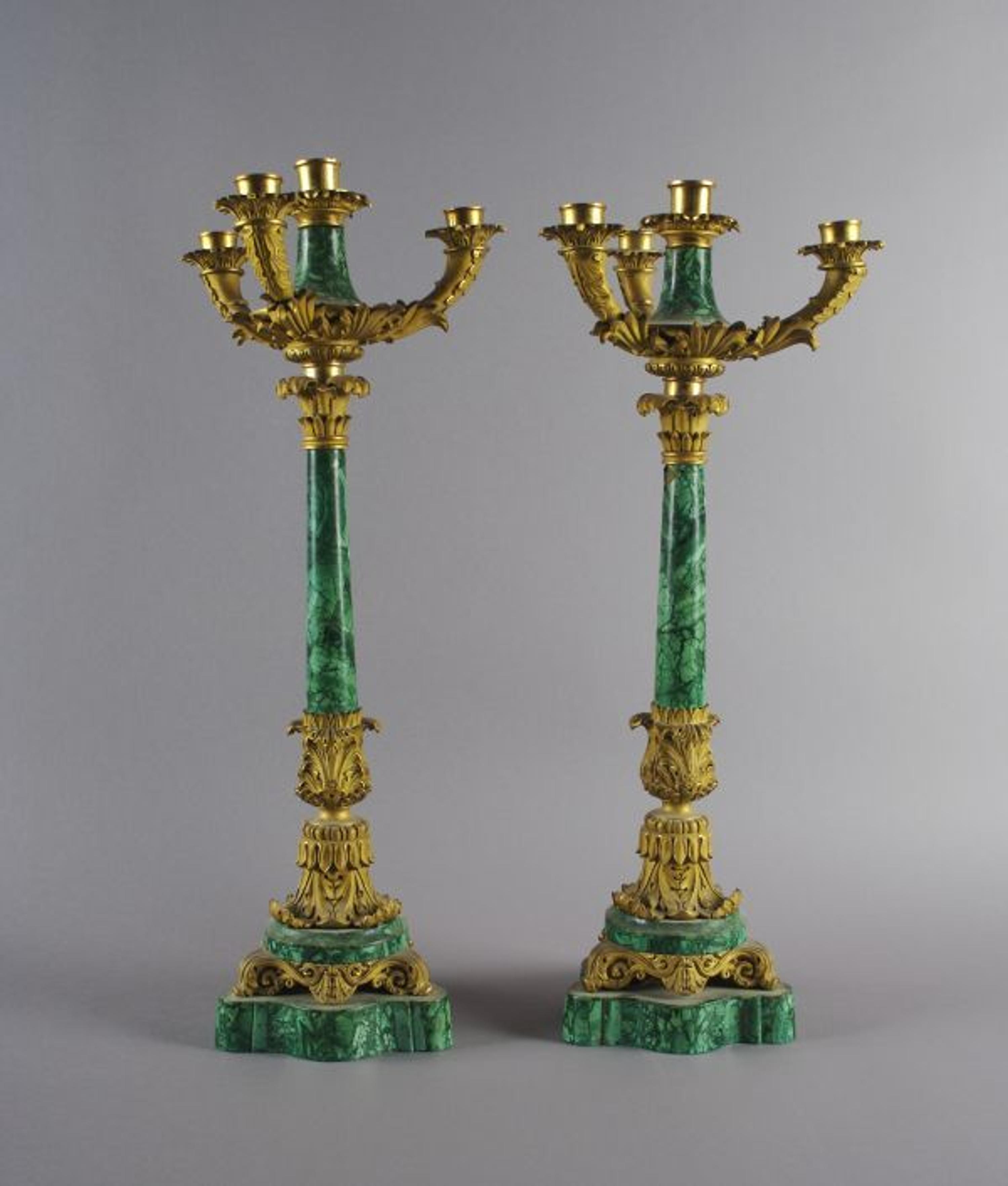 A Pair of Empire Style Ormolu and Malachite Four-Light Candelabra, Height 24 1/8 inches.